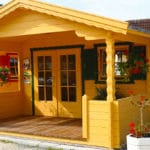 chalet en bois avec terrasse couverte