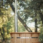 Protection métallique pour cheminée de poêle intérieur de bain nordique - vue principale